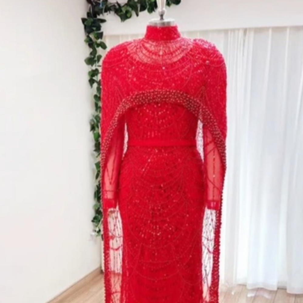 Red beaded gown with removable cape